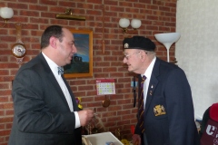 Ron Cornhill receiving the Legion d'Honneur from the French Consul Honoraire Jean-Claude Lafontaine.
